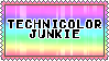 stamp that says technicolor junkie